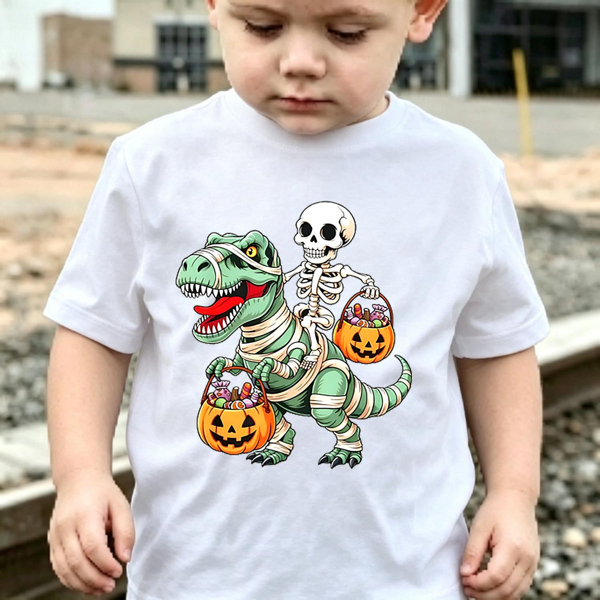 Halloween T-Shirt - Spooky Skeleton Riding Dinosaur & Pumpkin Graphic Tee - Boys & Girls Party Outfit - Soft Everyday Shirt - Birthday or Halloween Party Gift